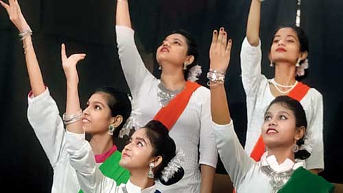 Senior school girls dance to the song Bharat ki beti on campus 