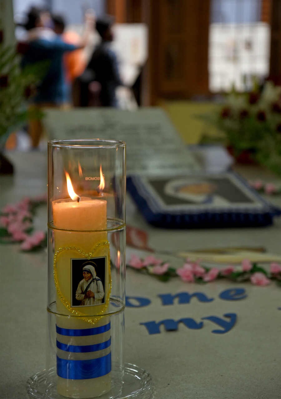 CANDLE OF STRENGTH: Tributes were offered throughout Sunday to Mother Teresa outside Allen Park on Park Street on the occasion of the Feast of Mother Teresa. The day started with the lighting of candles by nuns of the Missionaries of Charity (picture above) , followed by prayers by priests from various churches.