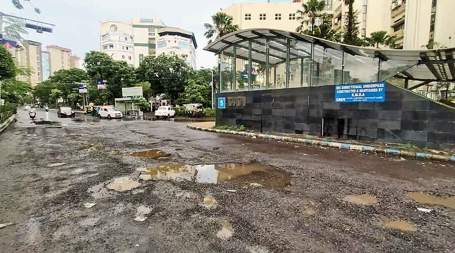 A cratered stretch of Broadway near the EM Bypass-SAI complex crossing.