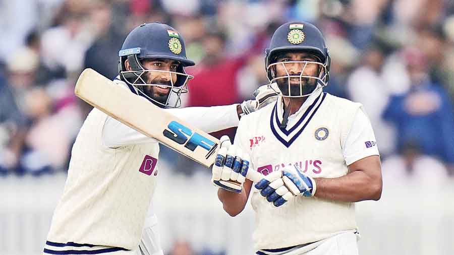 Jasprit Bumrah congratulates Mohammed Shami on his half century against England  on the final day of the second Test against England at Lord’s. 