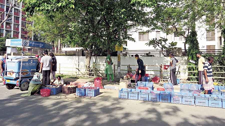 Sufal Bangla products on display on the pavement outside  Greenwood Sonata in March 2020.