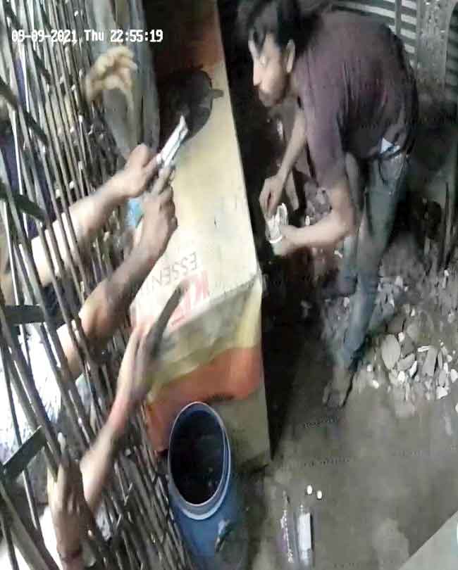 A man inside the house being targeted with multiple guns.