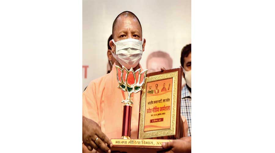 Yogi Adityanath at a media workshop organised at BJP headquarters in Lucknow on Monday