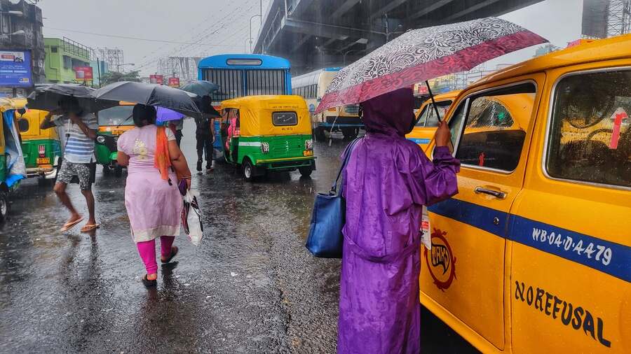 Soaked commuters on VIP Road on Tuesday morning 
