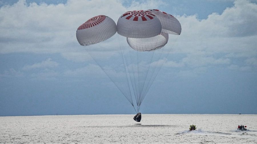 The four-member crew makes splashdown in the Atlantic off the Florida coast on Sunday.
