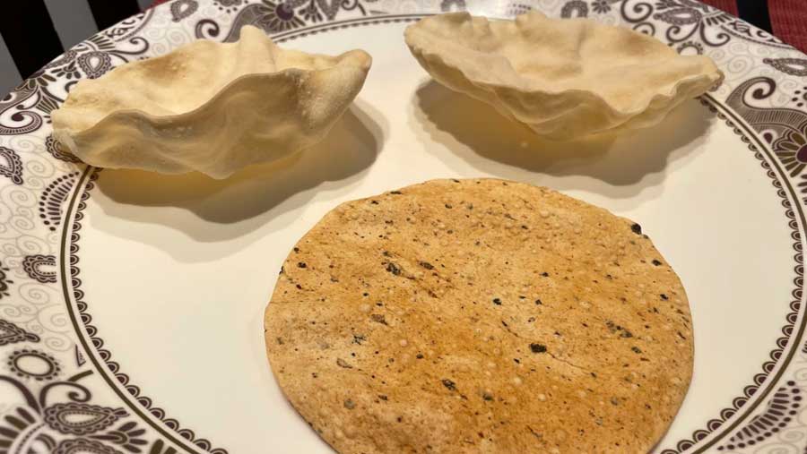 PAPAD: Who does not like papad with any meal? However, with khichuri it is an essential condiment. The crunchy papad can be used to scoop up the khichuri right into your mouth, feeling the papad slowly disappear into your morsel of khichuri is absolutely joyous. 