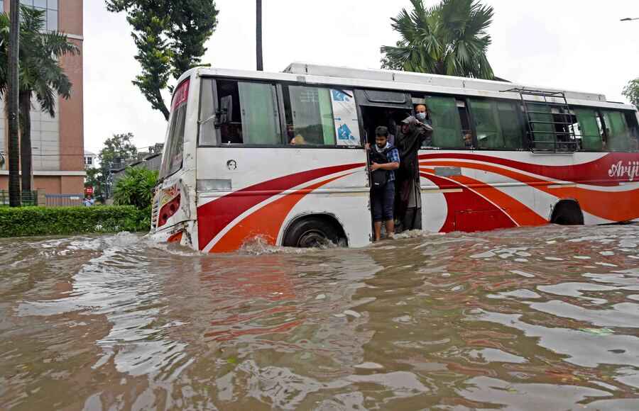 A bus wades through water at Sector V in Salt Lake on Monday morning. Bidhhannagar got the maximum rain in the 24 hours preceding 8.30am on Monday. The township got 142.8mm of rain and Kolkata was at second spot with 142mm