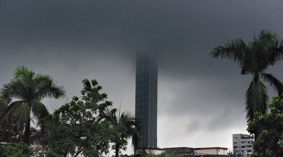 Dark clouds over The 42 in Chowringhee at 12.45pm on Monday. 