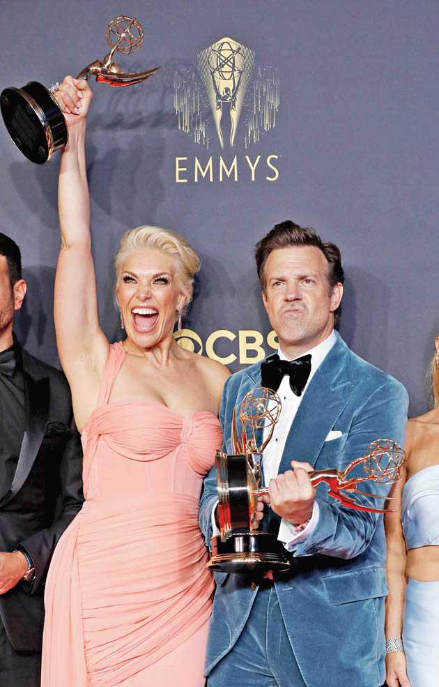 Hannah Waddingham and Jason Sudeikis celebrate their win