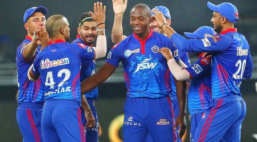 Overseas player in Delhi Capitals team has tested positive for Covid-19, forcing the franchise to delay its travel to Pune for its next IPL match.