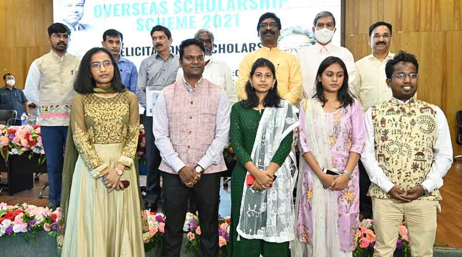 The first group of students who will be traveling to the UK for higher studies, thanks to the Jharkhand government's overseas scholarship scheme, with chief minister Hemant Soren in Ranchi on Thursday.