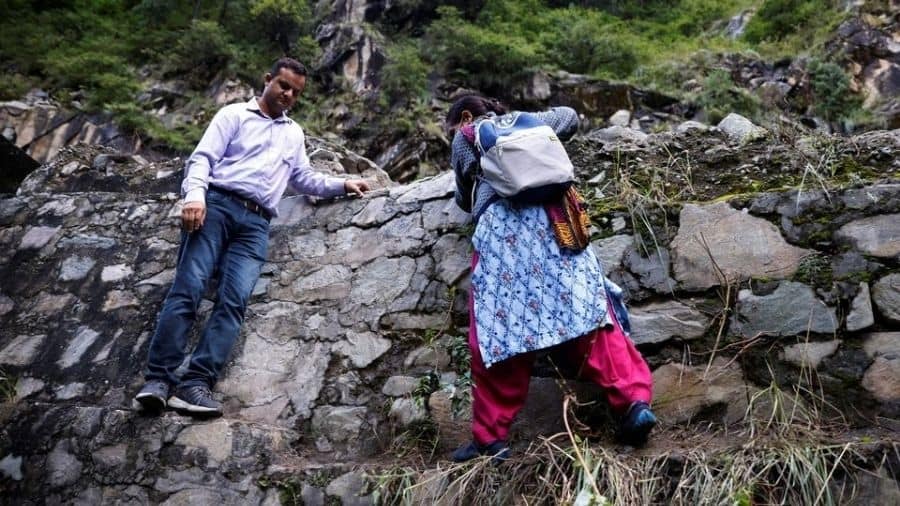Bimla Thakur, 56,  health worker, treks through mountains to vaccinate people in remote villages as a part of a vaccination drive  on September 14