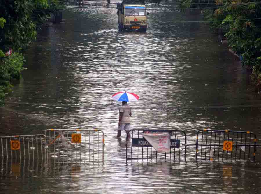 WATER WORLD: A stretch at Taratala in south Kolkata on Monday, September 20. Three weather systems — the monsoon trough and two cyclonic circulations — collided over the Kolkata skies to trigger the highest rain Kolkata has seen in September in a while. It sparked traffic snarls, power outages, and even deaths from electrocution.