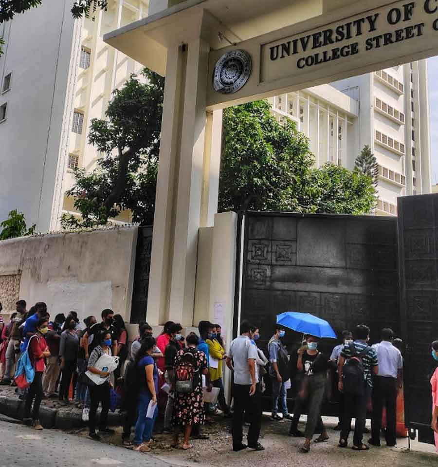 RITE OF PASSAGE: Students queue up to collect their migration certificates at the gates of the Calcutta University on Friday, September 24