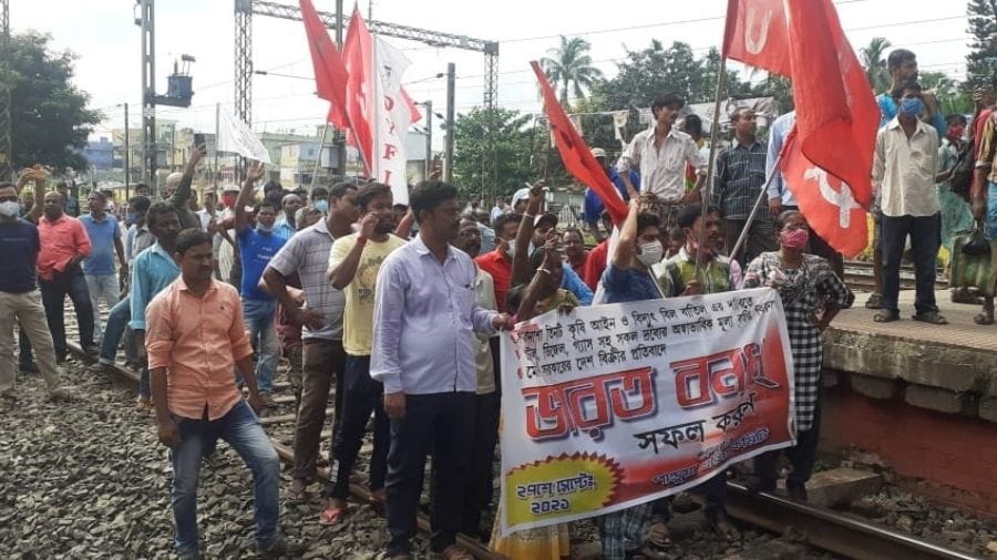 CPI(M) activists block a rainway track in Hoogly on Monday in support of Bharat Bandh.