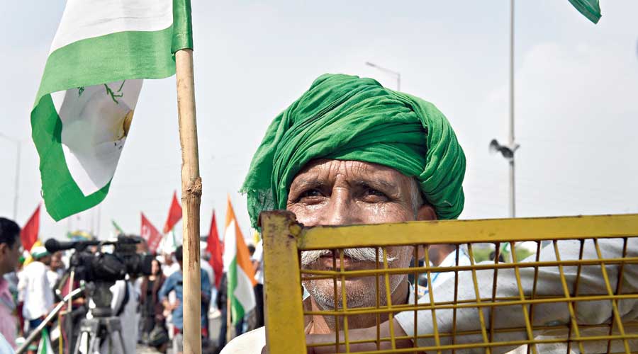 A farmer at the Ghazipur border in New Delhi on Monday during the Bharat Bandh  against three central  farm laws. 