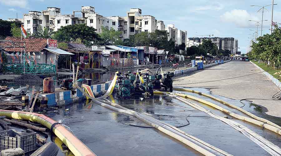 Pumps being used to drain out water near Sukhobrishti Housing Complex in Action Area III