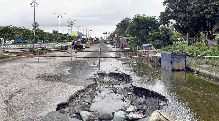 A road in Action Area II dug up to drain out water