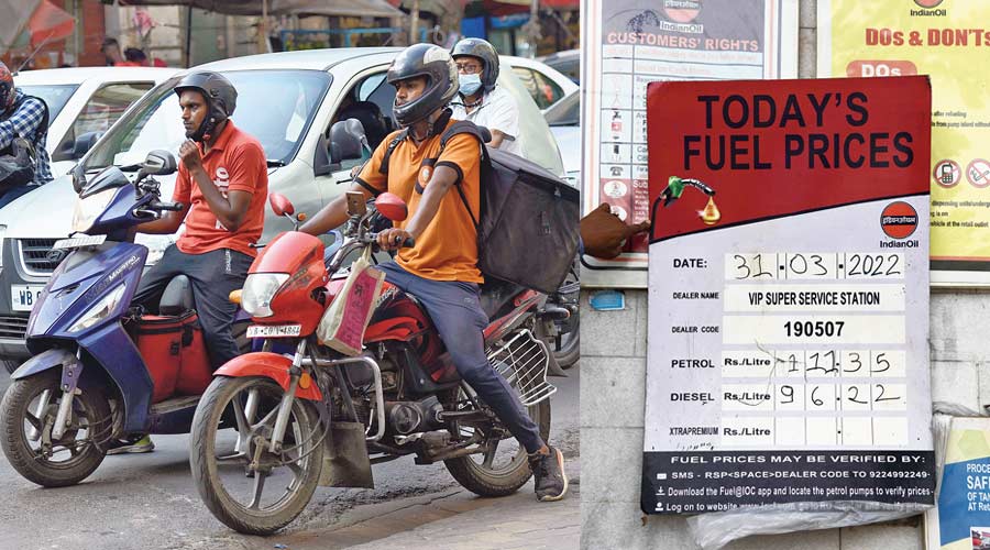 A food delivery partner (not the one mentioned in copy) on Park Street; (right) a board at a fuel pump in Phoolbagan displays the rates of petrol and diesel on Thursday. 