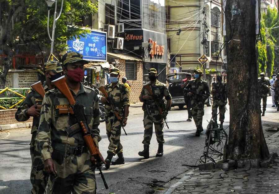 VIGILANT: Border Security Force personnel conduct a route march ahead of the Ballygunge Assembly by-election in the Gariahat area on Tuesday, March 29. The by-election will be held on April 12 