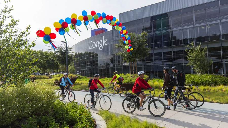 File picture of Google employees bicycling to work at the Googleplex in Mountain View