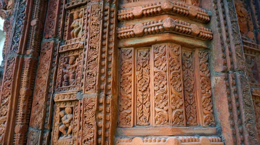 The octagonal Rekha Deul temple has terracotta work on all sides and along with figurines, there are detailed floral motifs in the designs
