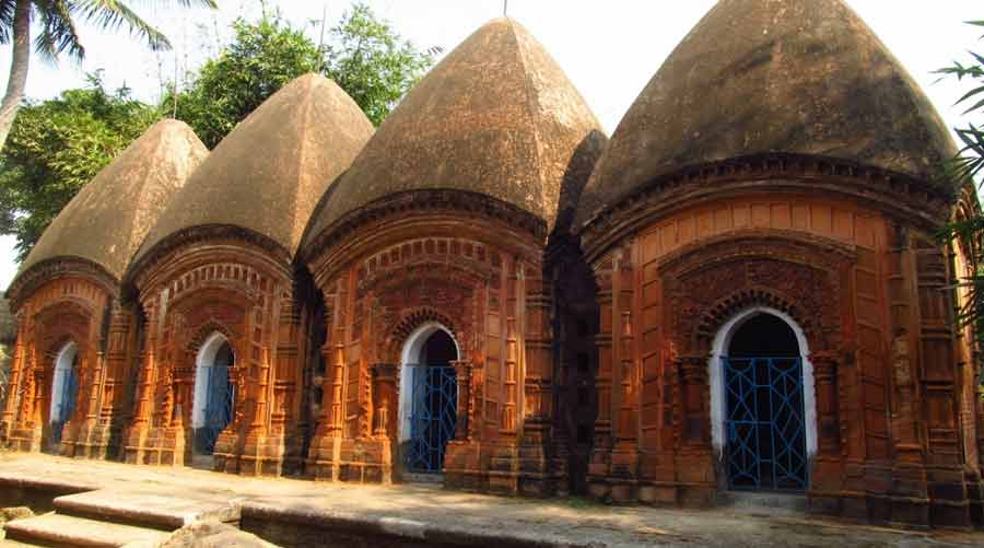 The villages and towns around Bolpur are dotted with temples with exquisite terracotta work, such as these 'charchala' temples at Uchkaran