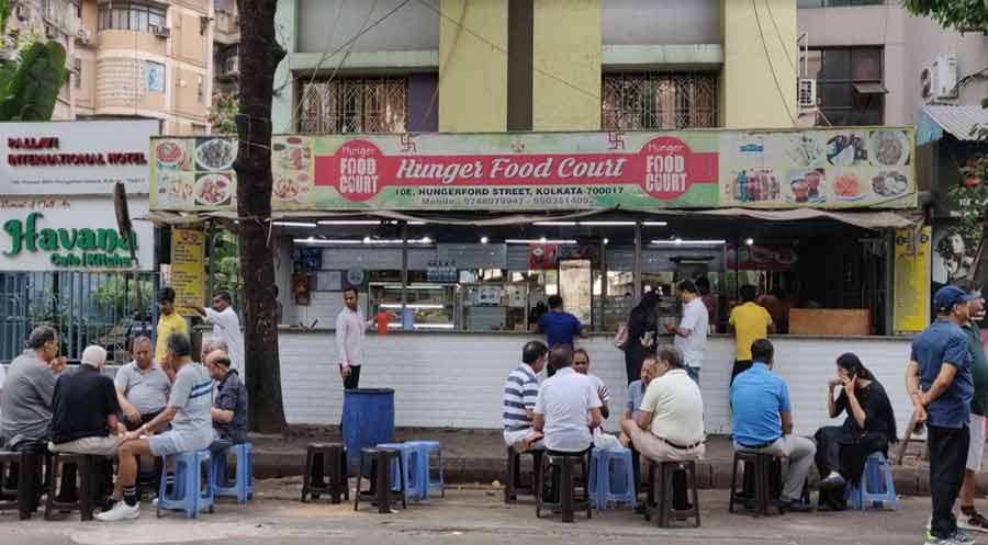 For more breakfast options, grab a stool outside Hunger Food Court and order a plate of crispy masala dosa or a filling aloo bonda. The eatery remains busy through the day as office-goers queue up for meals