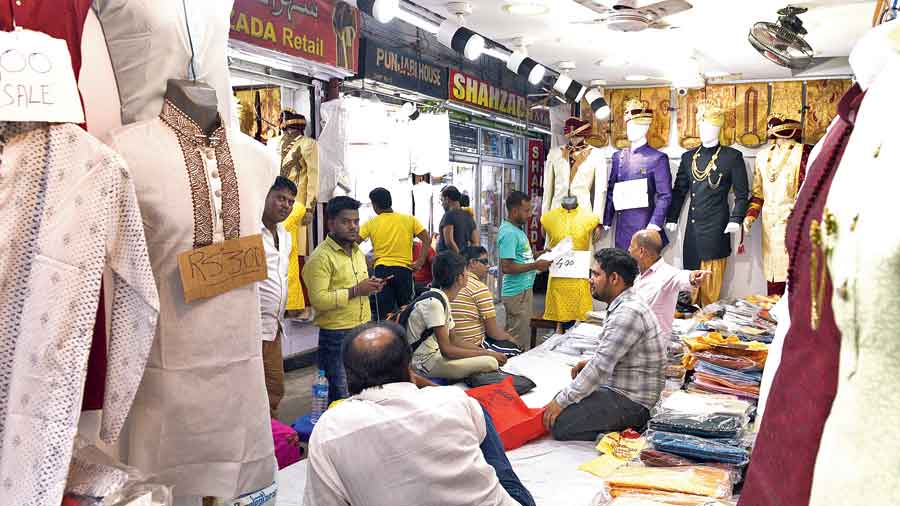 Shoppers at a garments store on Zakaria Street