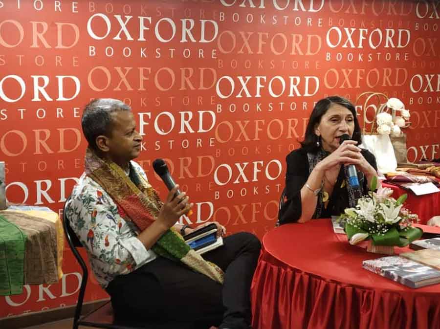 (From left) Columnist Sandip Roy and celebrated French textile artist and author Isabelle Moulin discuss the latter’s new book ‘Impressions Indiennes’ at Oxford Bookstore on Park Street on Thursday