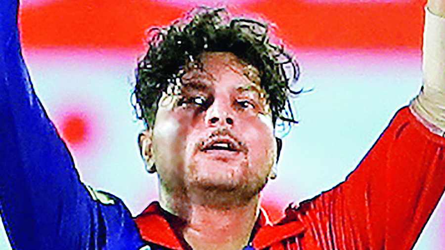 Kuldeep Yadav after taking one of his four wickets  on Sunday.
