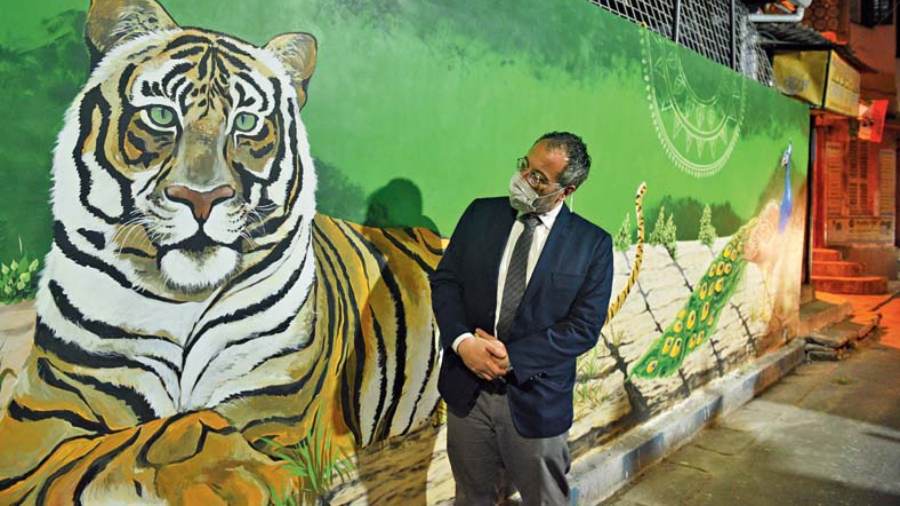 Consul general of Italy in Kolkata Gianluca Rubagotti checks out the mural