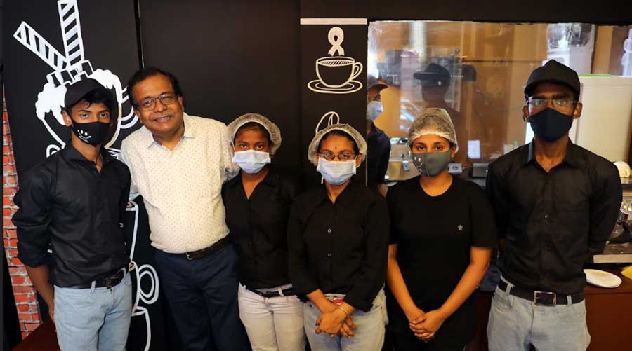 The Cafe Positive team led by (second from left) Kallol Ghosh 