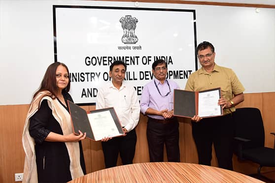 NIESBUD director Poonam Sinha (extreme left) and CUJ vice-chancellor Kshiti Bhusan Das after signing the MoU in Delhi on April 12.