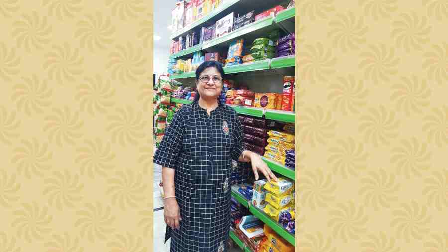 Rita Gupta manning her grocery store in BJ Block. She has single-handedly saved a smilar store from armed dacoits before. 
