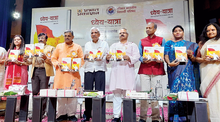 Former chief election commissioner Sunil Arora (fourth from left, in white shirt) at the release of the book on the ABVP’s history. Arora is flanked by Dattatreya Hosabale (third from left), national general secretary of the RSS, and  Sunil Ambekar (third from right), all-India head of publicity of the RSS.