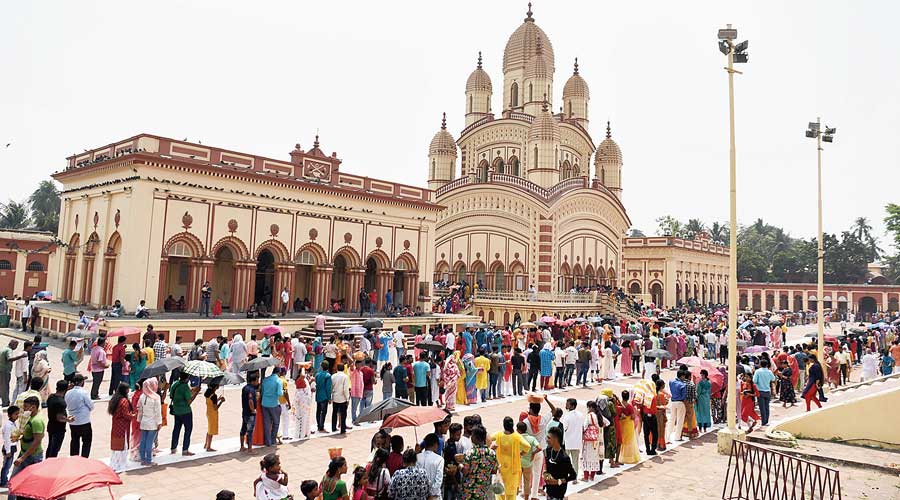 Devotees queue up at Dakshineswar temple on Friday. 