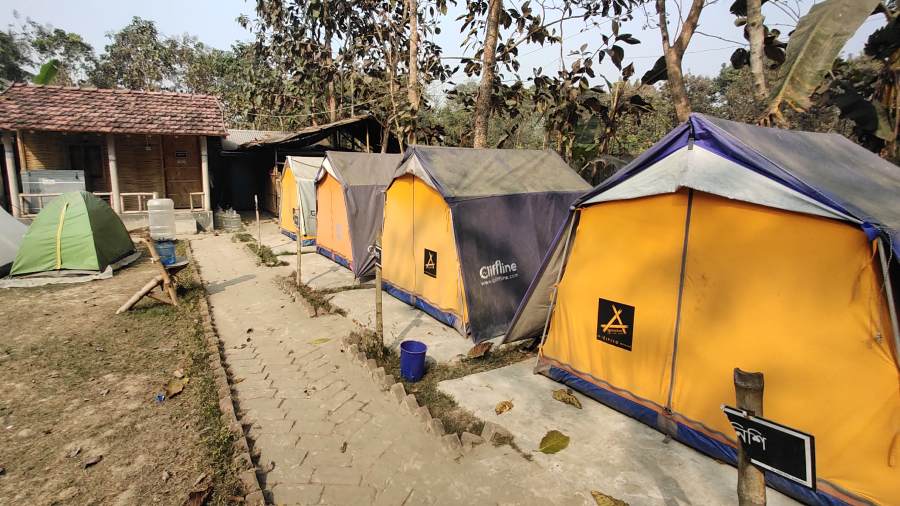  ROUGH RIDES: Backpackers’ tents by the Ichhamati river in Mangalgunj village in North 24-Parganas