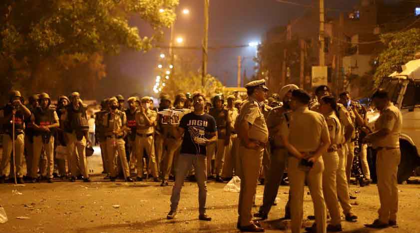 Cops at Delhi's Jahangirpuri where tension erupted during Hanuman Jayanti celebrations