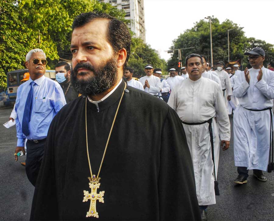 Christian priests of different denominations walk at a rally celebrating Easter Sunday. Over 500 people were in attendance at the rally from St Paul’s Cathedral to the St James’ School ground on Sunday evening