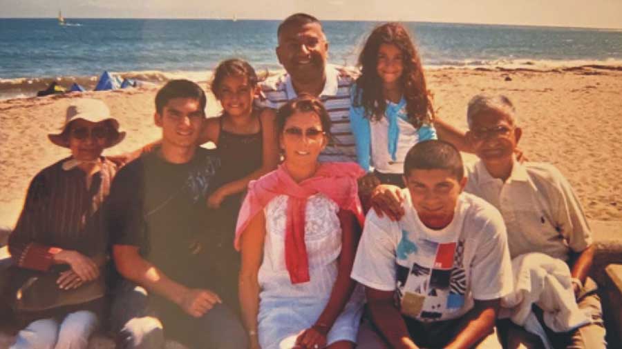 Rekha Datta (far left) with her family. She would visit her son for three months in summer to get away from the Mumbai monsoon, and two months in winter. She luxuriated in the lives of her grandchildren, and would simply sit with them for hours, watching them playing tennis even though she was not a sportswoman