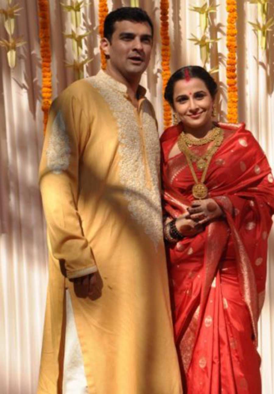 Vidya Balan: Vidya’s red and gold bridal sari was elegant yet timeless. Despite being simplistic, it echoed Sabyasachi’s design ethos. The actor's old school styling was a breath of fresh air as she styled her look with gold jewellery which complemented the metallic detailing on her sari 