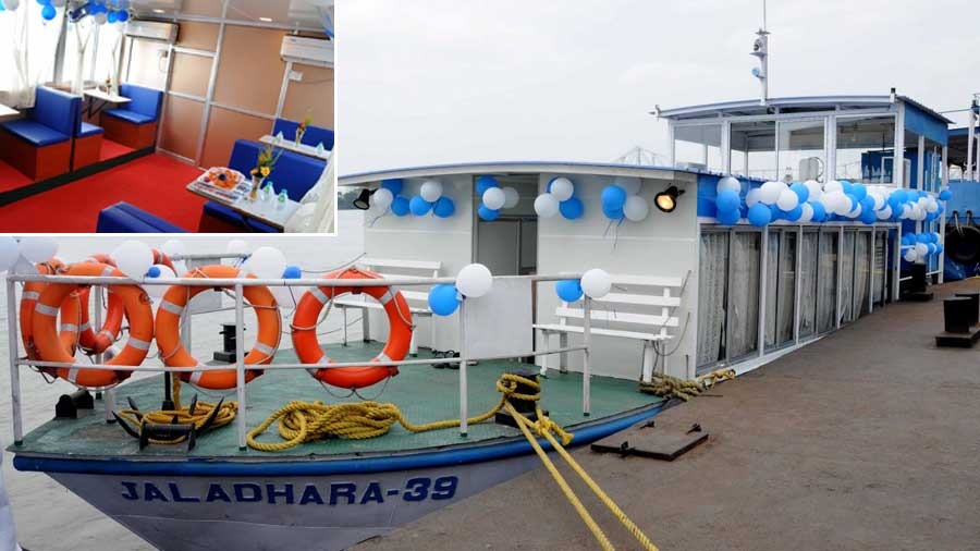 Sagari, a 20-seater AC launch, that will take visitors on pleasure rides on the Hooghly river and (inset) the seating arrangement inside the vessel. State transport minister Firhad Hakim inaugurated the vessel on Tuesday. A ride on Sagari would cost Rs 190 per person. The ride would include complimentary tea and biscuits