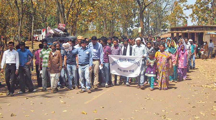 Tribals attend the meeting at the site of the Netarhat firing range in Latehar in March.