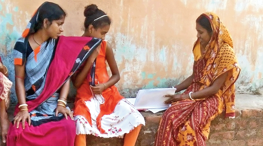 A volunteer of the samity carries out the survey at a village in Jharkhand earlier this month.