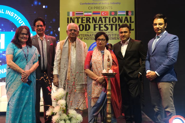 (From left) Sanjukta Bose and Dr Suborno Bose of IIHM, state ministers Sovandeb Chattopadhyay and Chandrima Bhattacharya, Debaditya Chaudhury, MD of Chowman Hospitality, and Prashant Sharma, chairman, CII West Bengal, performed the traditional ‘lighting of the lamp’