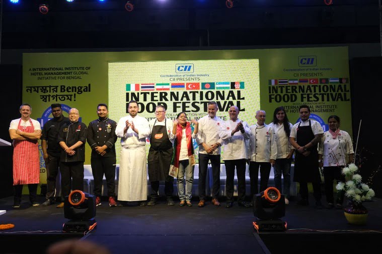 The battalion of 14 chefs, representing14 countries, strike a pose at the inauguration ceremony 