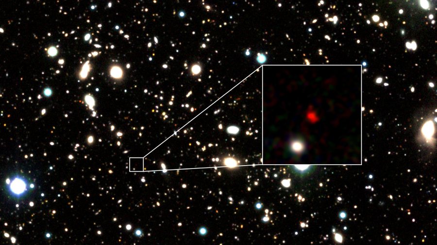 A photo showing HD1, a reddish blob that appears to be the earliest and most distant galaxy ever seen