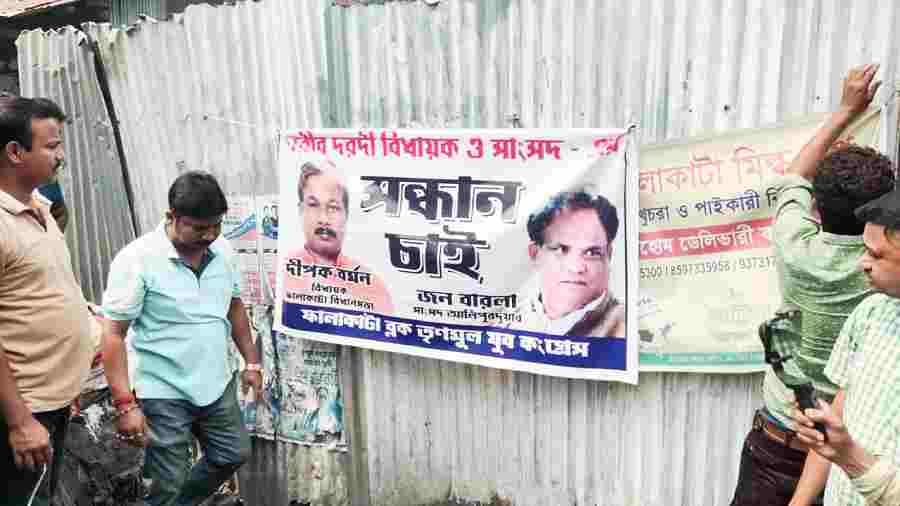 A banner hung by Trinamul supporters at Falakata on Sunday against the local  BJP MP and the MLA. 