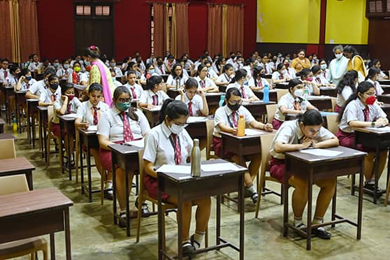Students read the question carefully before starting to write. The exam began at 2pm and students were handed over the question papers at 1.50pm, giving them 10 minutes of reading time. 